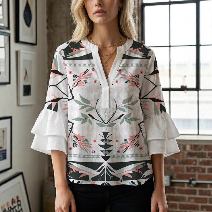 Dame avslappnad blus med volangärmar och botaniskt tryck Mirla-Eva Jonsson