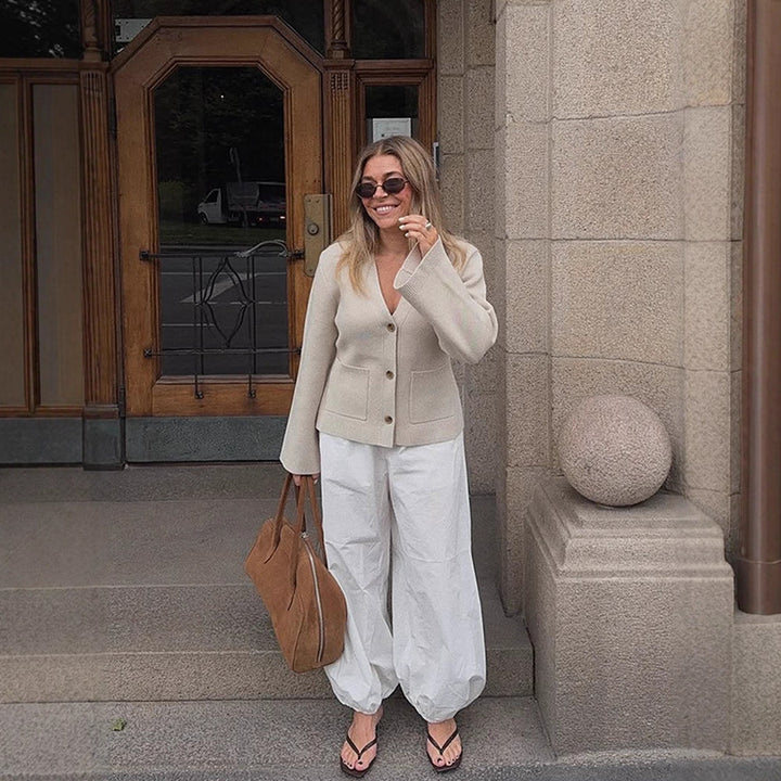 Dame avslappnad cardigan med vida ärmar och knappp detaljer Mirla-Eva Jonsson