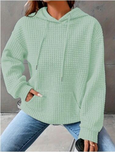 Dame avslappnad hoodie med strukturerad yta och praktisk känguruficka Eva Jonsson-Eva Jonsson