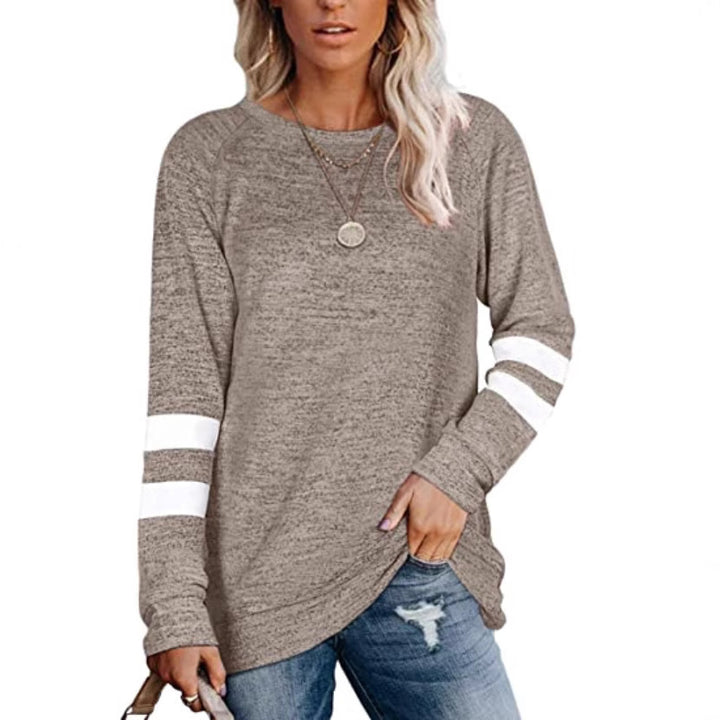 Dame avslappnad oversized tröja med sportiga randdetaljer Mirla-Eva Jonsson