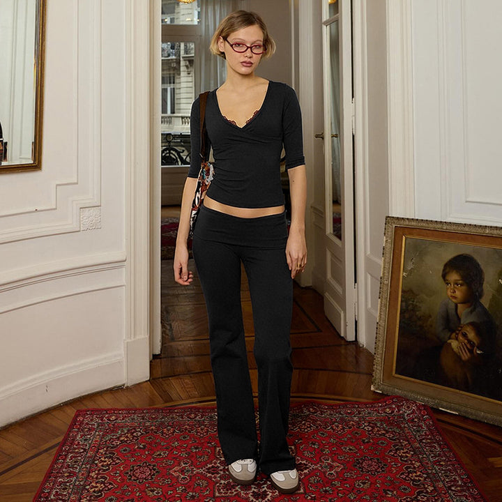 Dame avslappnad set av elegant topp och flödande utsvängda byxor Mirla-Eva Jonsson
