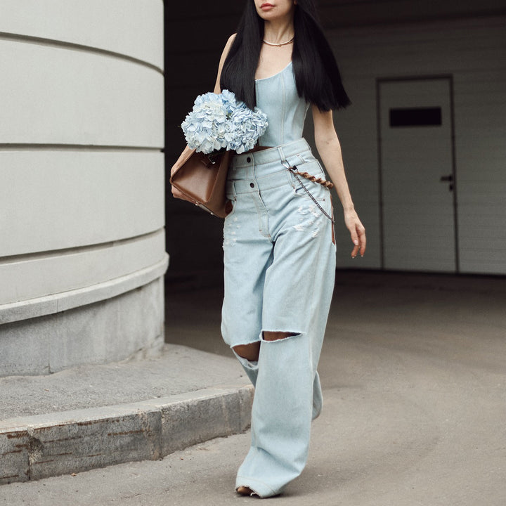 Dame avslappnade high-waist jeans med unika rivdetaljer och lös passform Mirla-Eva Jonsson