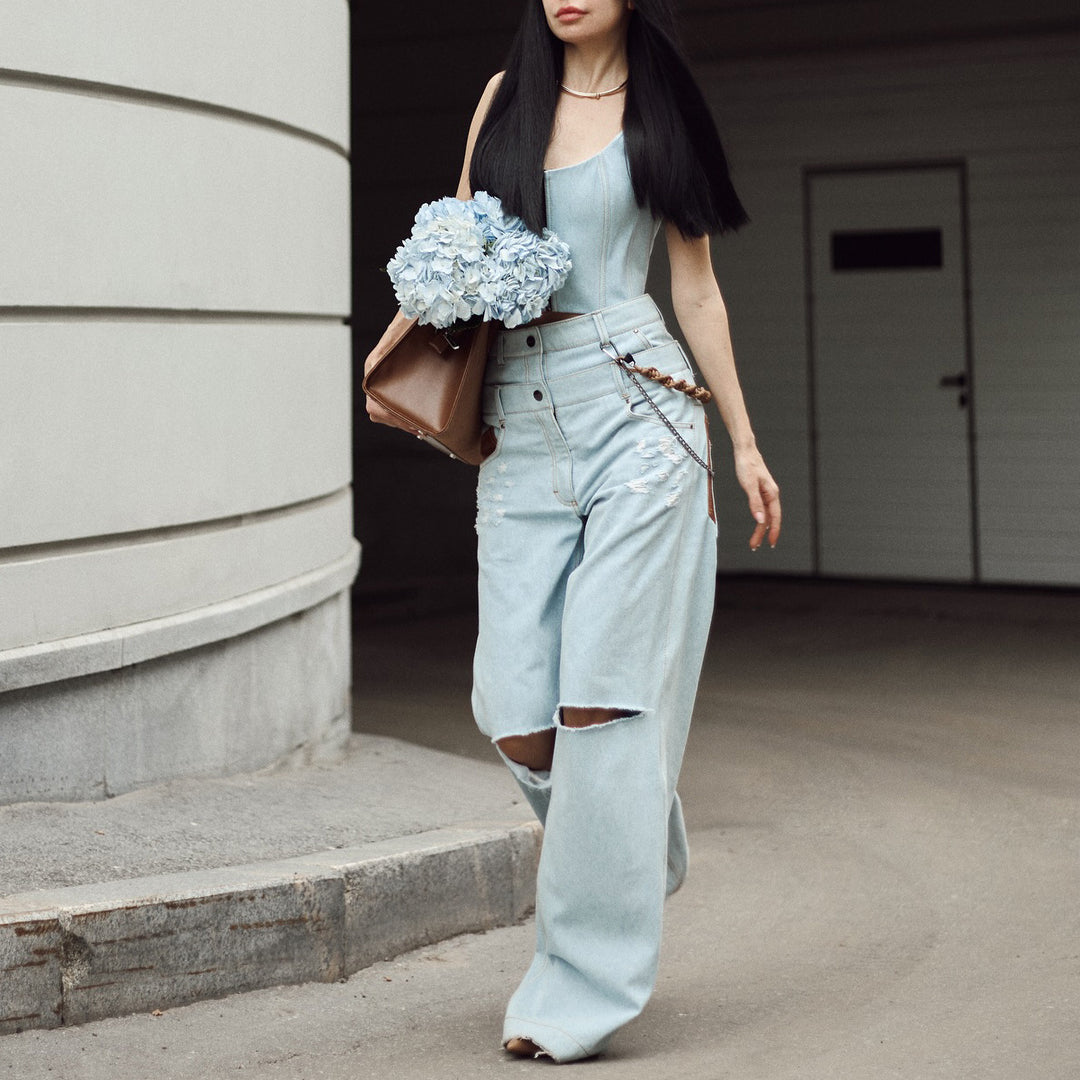 Dame avslappnade high-waist jeans med unika rivdetaljer och lös passform Mirla-Eva Jonsson