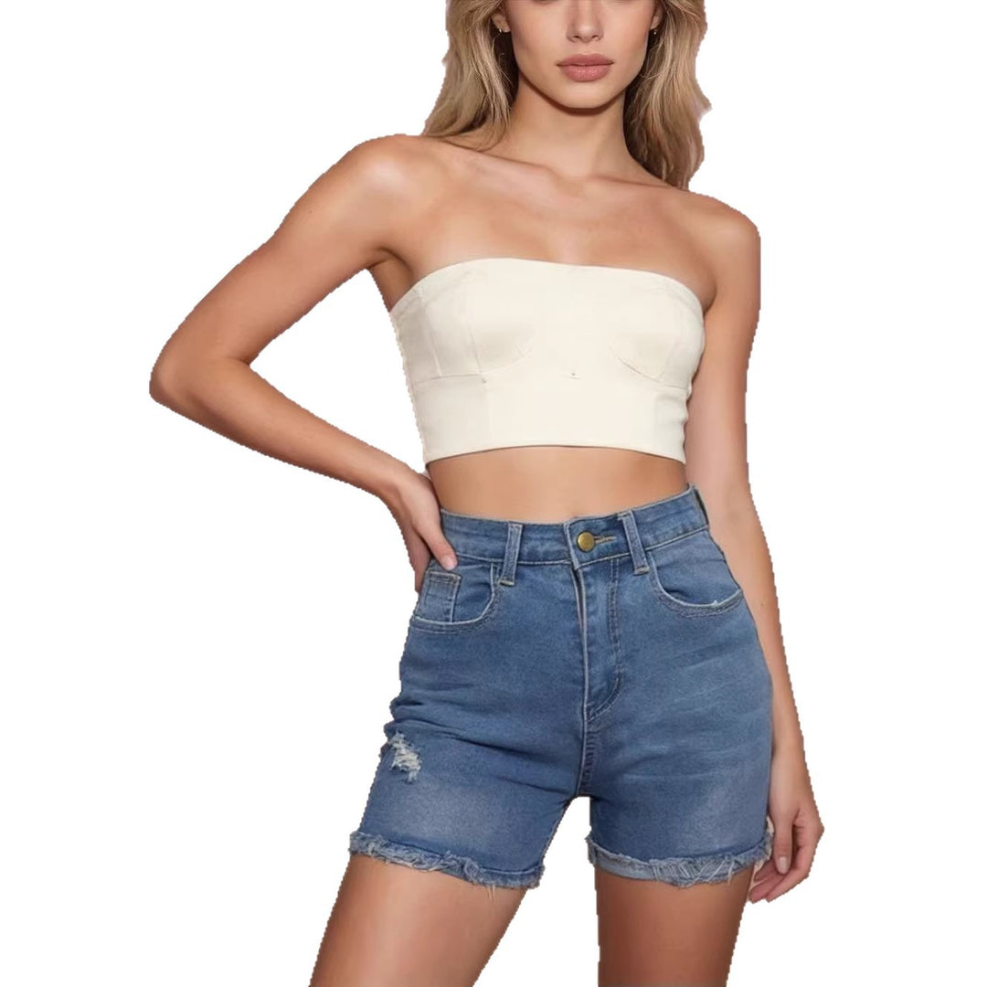 Dame avslappnade högmidjade denimshorts med fransar och trendiga förstörda detaljer Mirla-Eva Jonsson