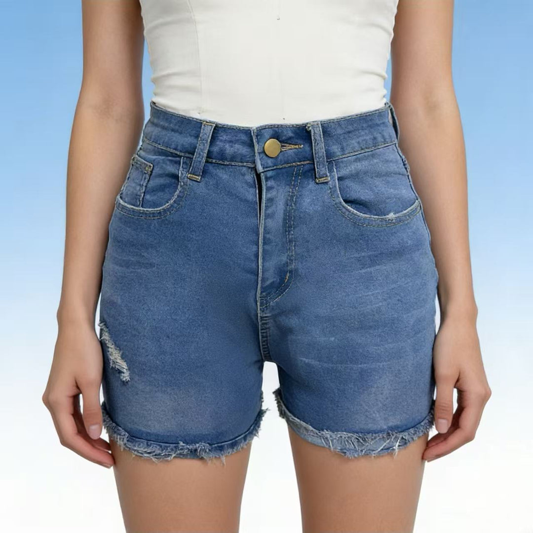Dame avslappnade högmidjade denimshorts med fransar och trendiga förstörda detaljer Mirla-Eva Jonsson
