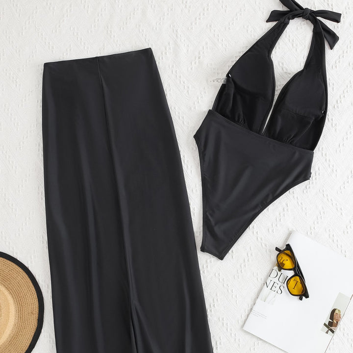 Dame baddräkt med elegant omwrappedesign och glamorös rem Mirla-Eva Jonsson