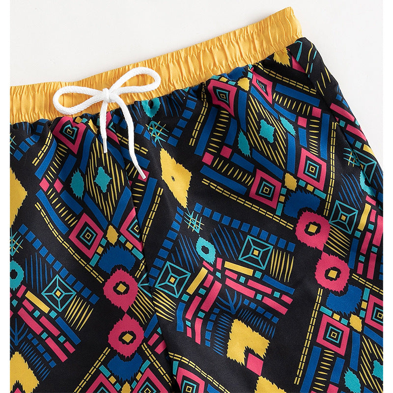 Dame badshorts med elastisk midja och färgglada geometriska mönster Mirla-Eva Jonsson