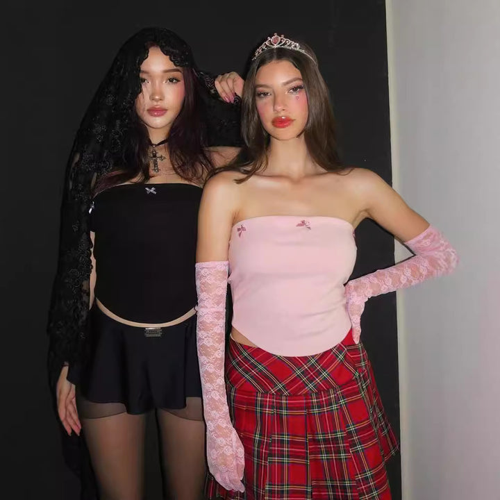 Dame bandeau-top med lekfulla rosettdetaljer Mirla-Eva Jonsson