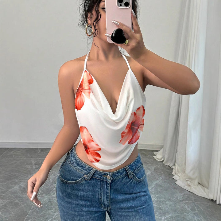 Dame blouse top med djup V-ringning och blommigt mönster Mirla-Eva Jonsson