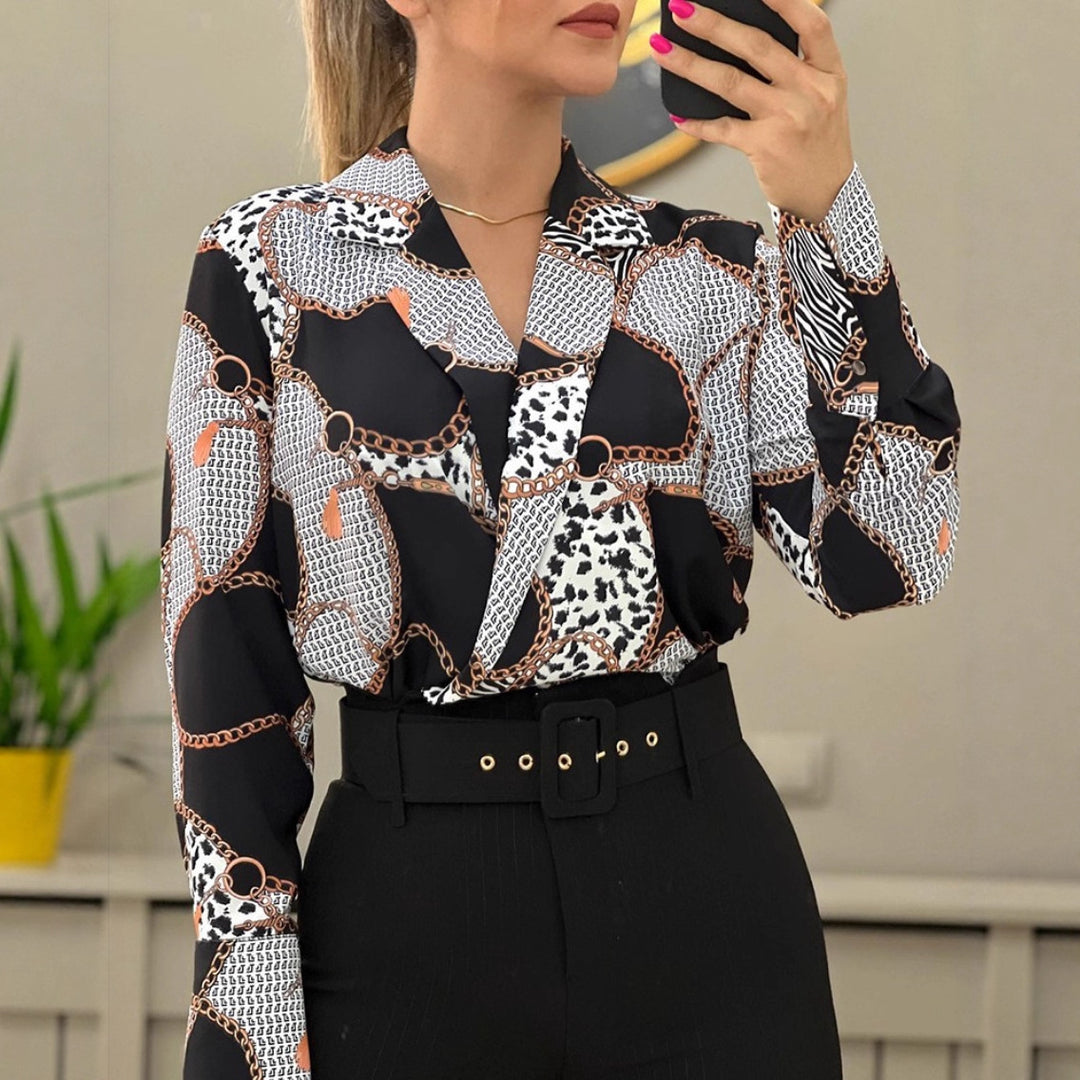 Dame blus med iögonfallande kedjemönster och elegant skärning Mirla-Eva Jonsson