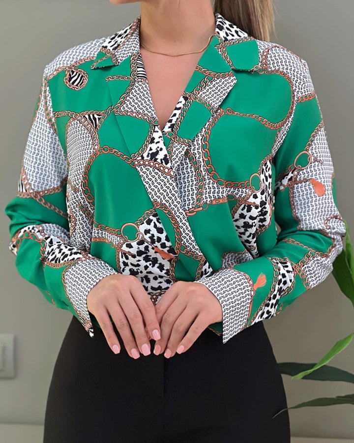 Dame blus med iögonfallande kedjemönster och elegant skärning Mirla-Eva Jonsson