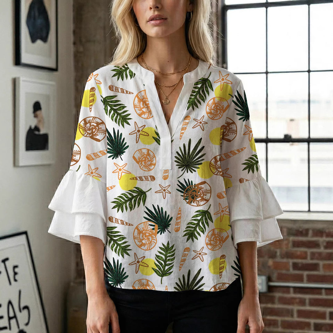 Dame blus med voluminösa volangärmar och modernt motiv Mirla-Eva Jonsson