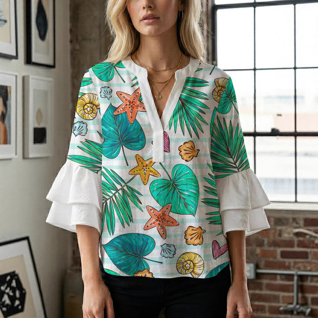 Dame blus med voluminösa volangärmar och modernt motiv Mirla-Eva Jonsson
