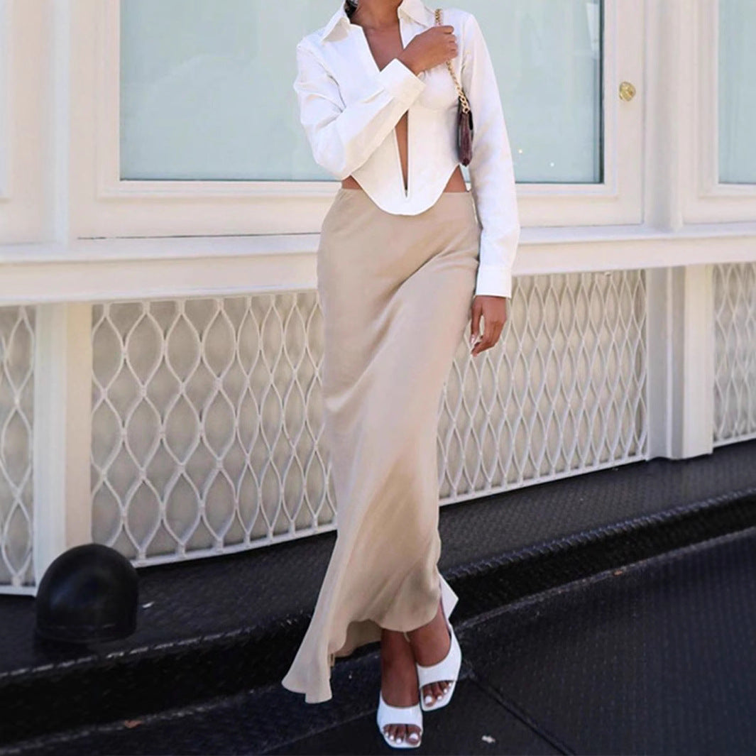 Dame blusbody med djup V-ringning och figursydd design Mirla-Eva Jonsson