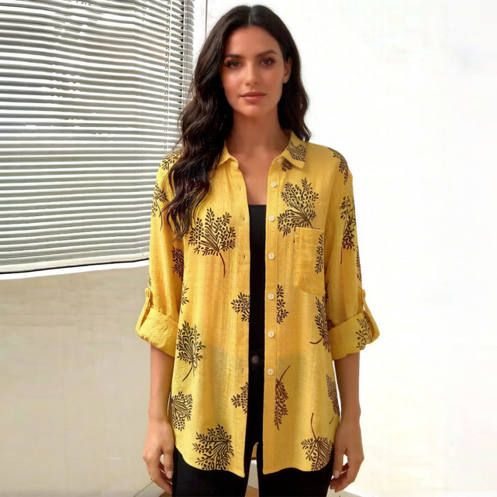 Dame blusenshirt med blommigt motiv och avslappnad skärning Mirla-Eva Jonsson