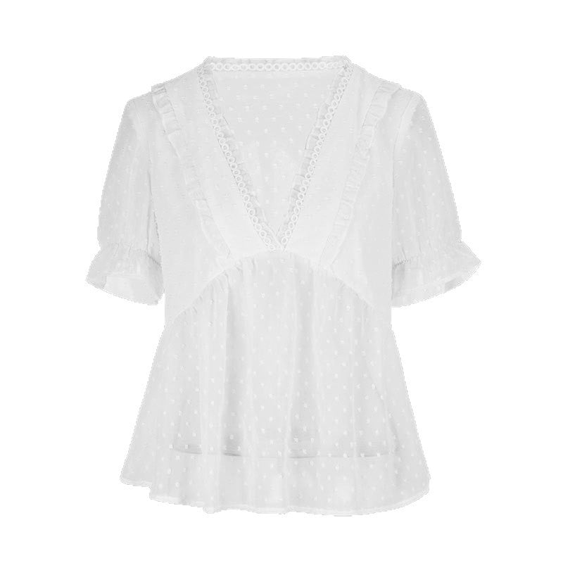 Dame blusenshirt med volangdetaljer och prickigt mönster Mirla-Eva Jonsson