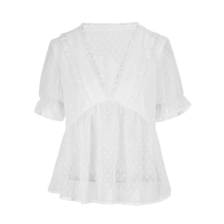 Dame blusenshirt med volangdetaljer och prickigt mönster Mirla-Eva Jonsson