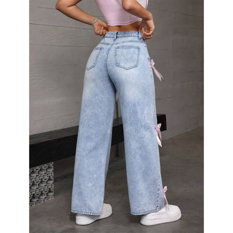 Dame breda jeans med dekorativa rosett-detaljer Mirla-Eva Jonsson
