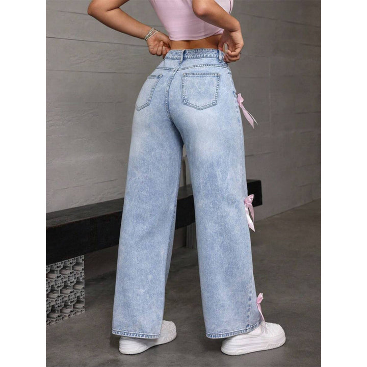 Dame breda jeans med dekorativa rosett-detaljer Mirla-Eva Jonsson