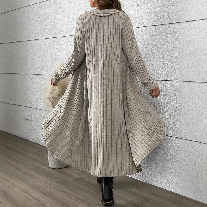 Dame cardigan med asymmetrisk snitt och dekorativt bälte Mirla-Eva Jonsson