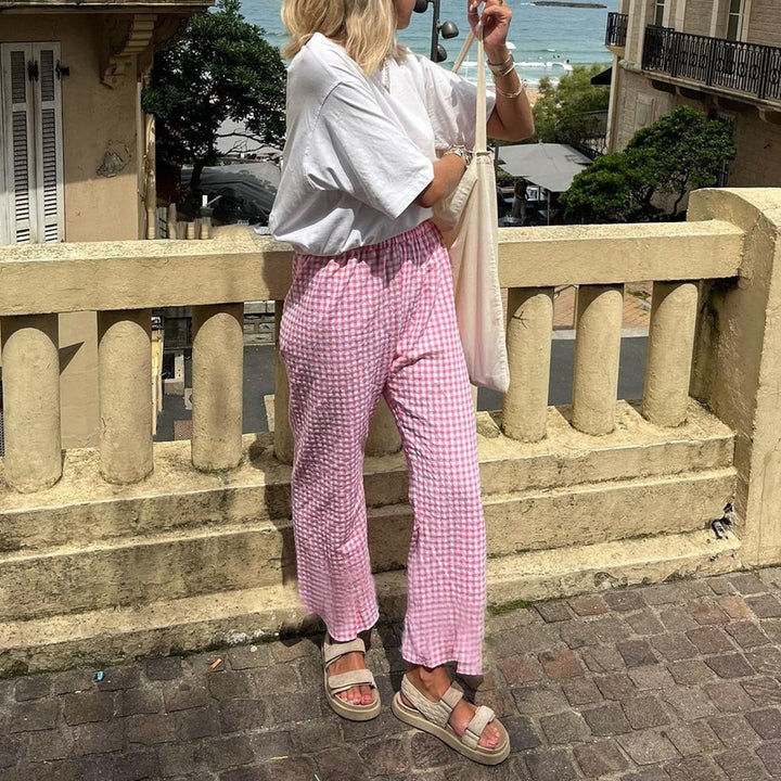 Dame carrot pants in modern check design Mirla-Eva Jonsson