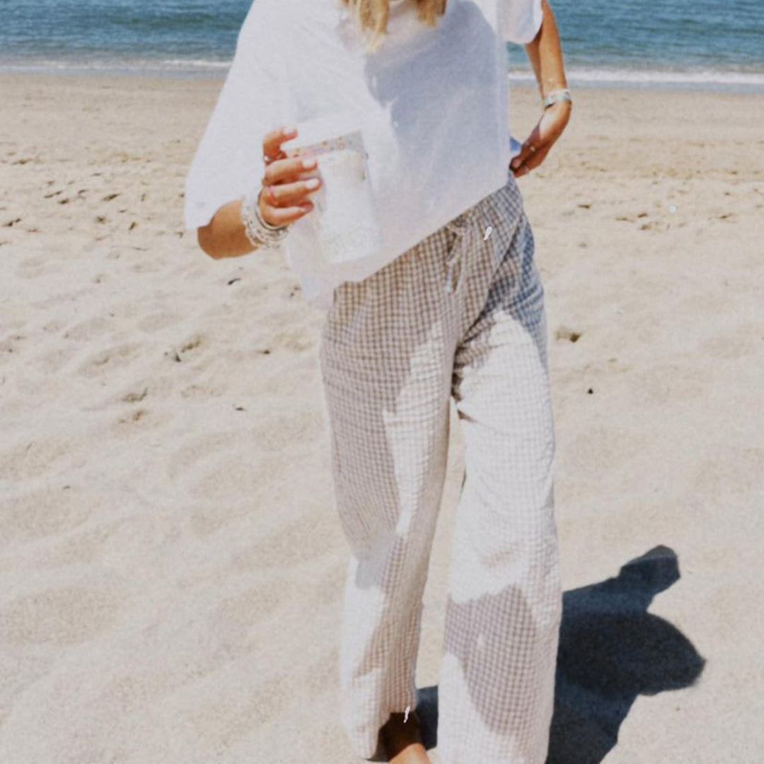 Dame carrot pants in modern check design Mirla-Eva Jonsson