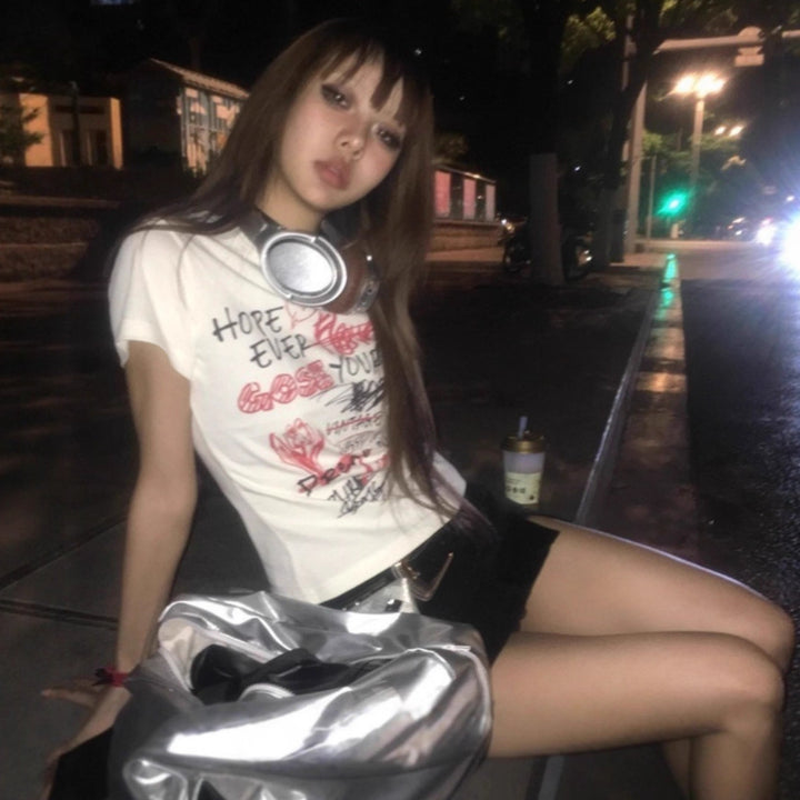 Dame casual statement t-shirt med kreativt tryck Mirla-Eva Jonsson