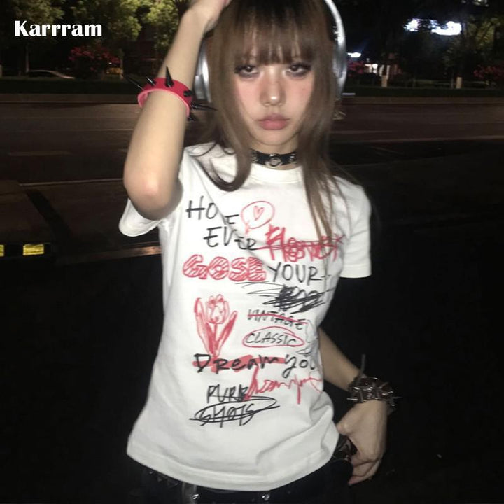 Dame casual statement t-shirt med kreativt tryck Mirla-Eva Jonsson