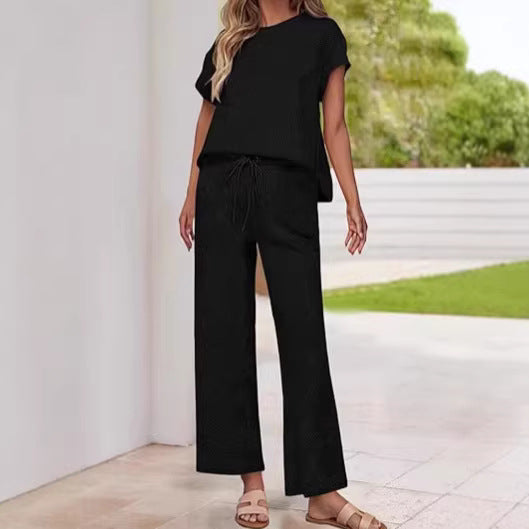Dame casual tvådelad set med högskuren byxa och avslappnad topp Mirla-Eva Jonsson