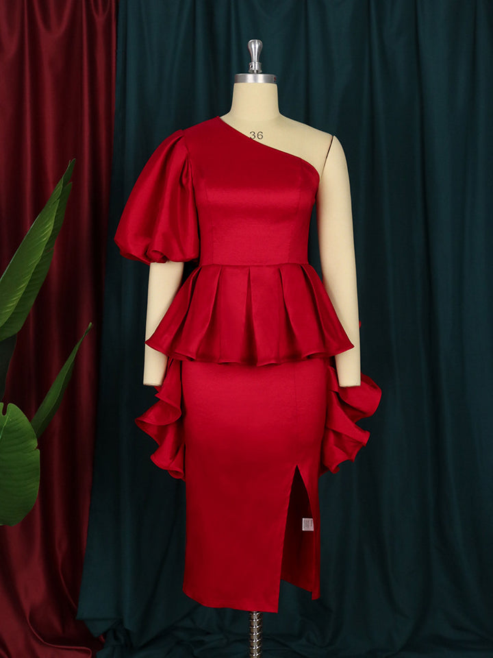 Dame cocktail dress with asymmetric cut and voluminous ruffle design Mirla-Eva Jonsson