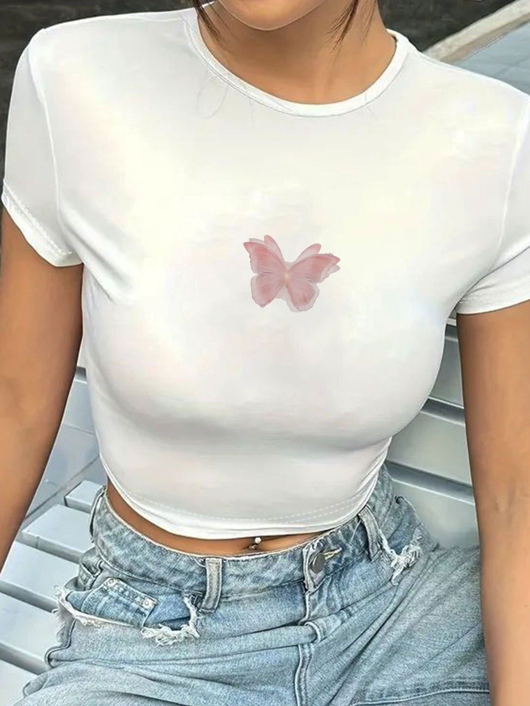 Dame crop-t-shirt med kreativa slipsdetaljer Mirla-Eva Jonsson