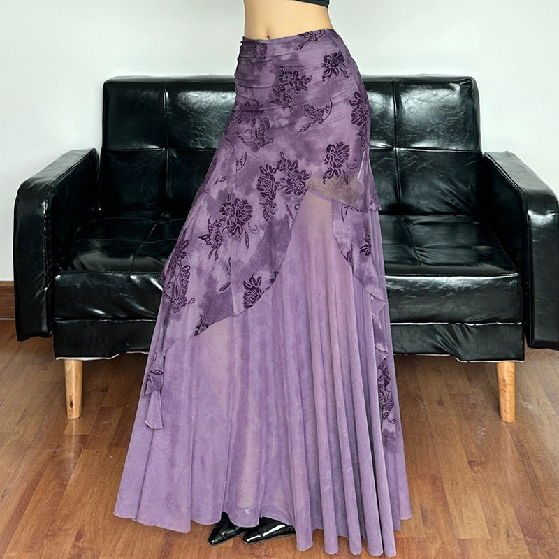 Dame elegant asymmetrisk maxikjol med blommiga dekorationer Mirla-Eva Jonsson