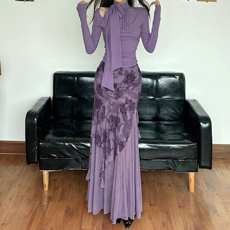 Dame elegant asymmetrisk maxikjol med blommiga dekorationer Mirla-Eva Jonsson