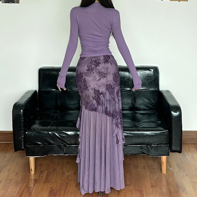 Dame elegant asymmetrisk maxikjol med blommiga dekorationer Mirla-Eva Jonsson