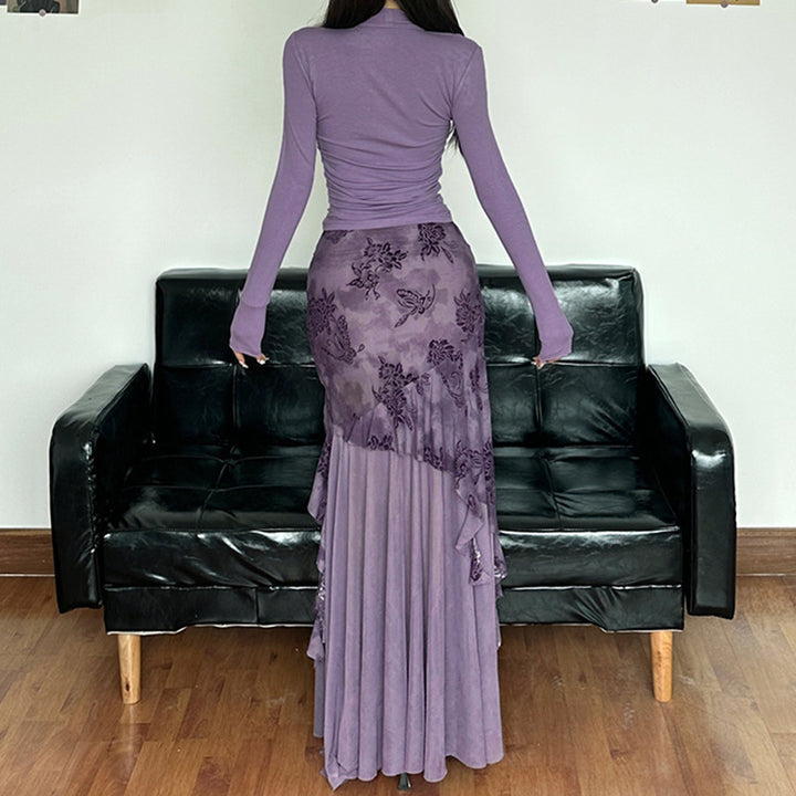 Dame elegant asymmetrisk maxikjol med blommiga dekorationer Mirla-Eva Jonsson