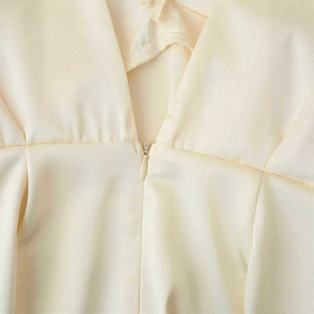 Dame elegant blus med djup V-ringning och vida ärmar Eva Jonsson-Eva Jonsson