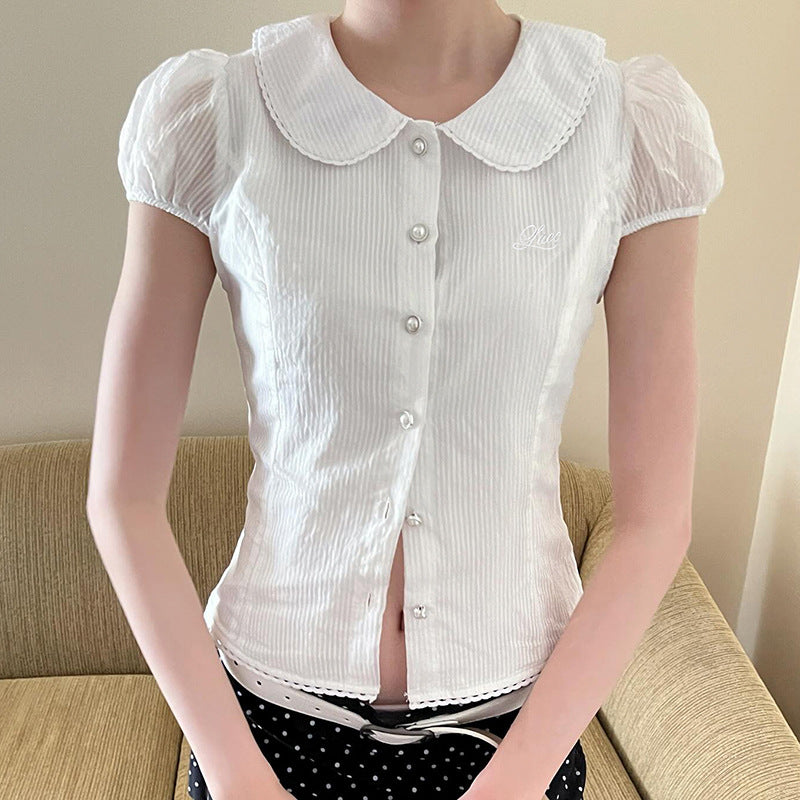 Dame elegant blus med ståkrage och dekorativa knappdetaljer Mirla-Eva Jonsson