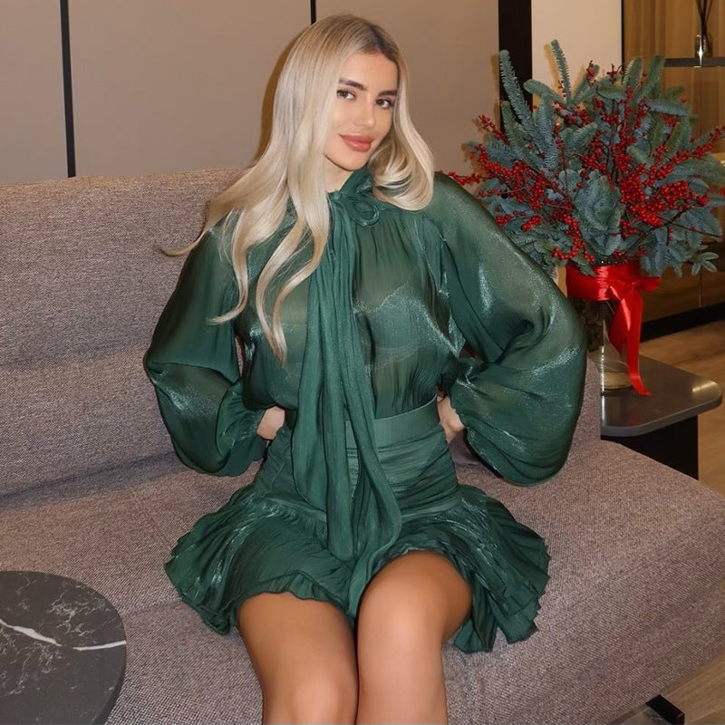 Dame elegant chiffongklänning med volangdetaljer och knytbälte Mirla-Eva Jonsson