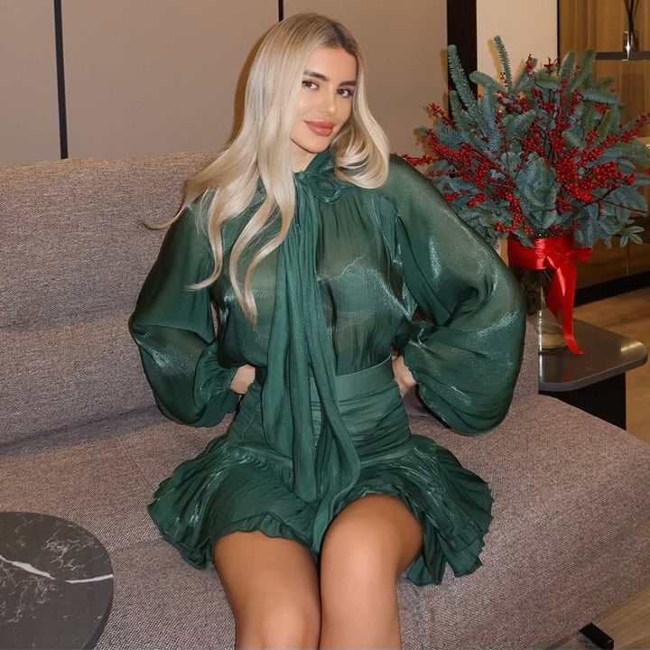 Dame elegant chiffongklänning med volangdetaljer och knytbälte Mirla-Eva Jonsson