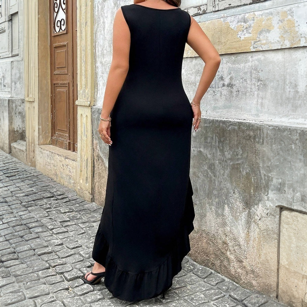 Dame elegant maxiklänning med asymmetrisk fåll och volangdetaljer Mirla-Eva Jonsson