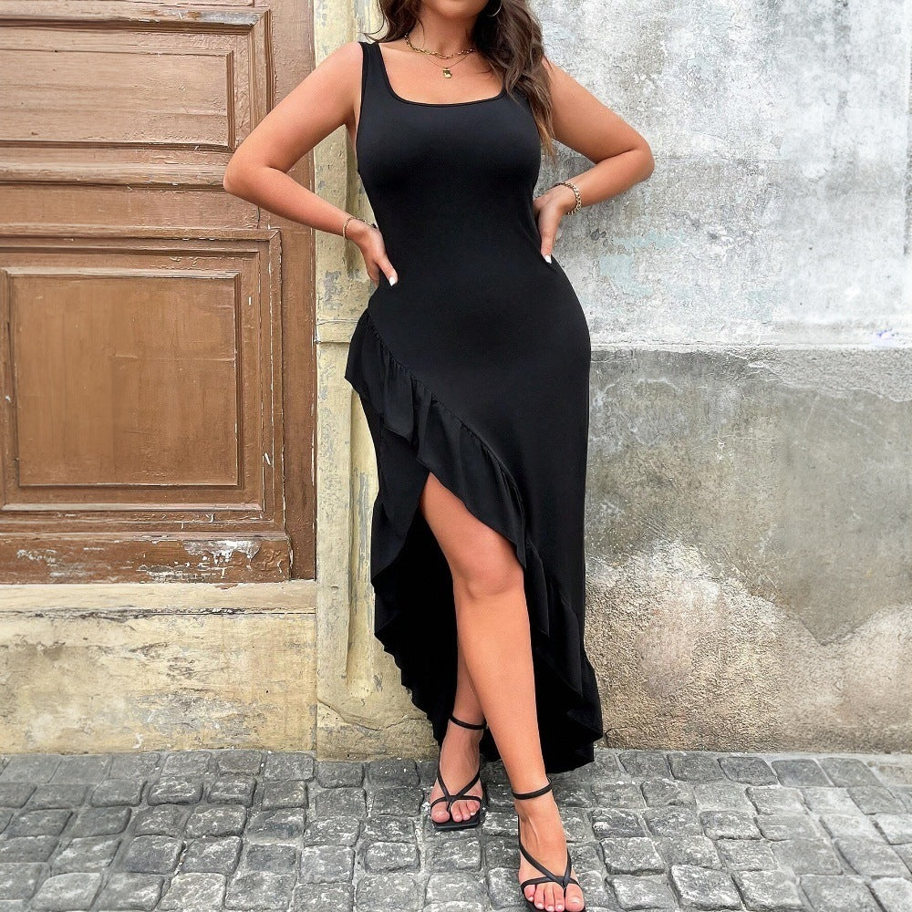 Dame elegant maxiklänning med asymmetrisk fåll och volangdetaljer Mirla-Eva Jonsson