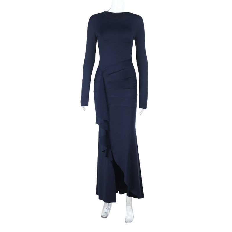 Dame elegant maxiklänning med asymmetrisk volanginsats och lång silhuett Mirla-Eva Jonsson