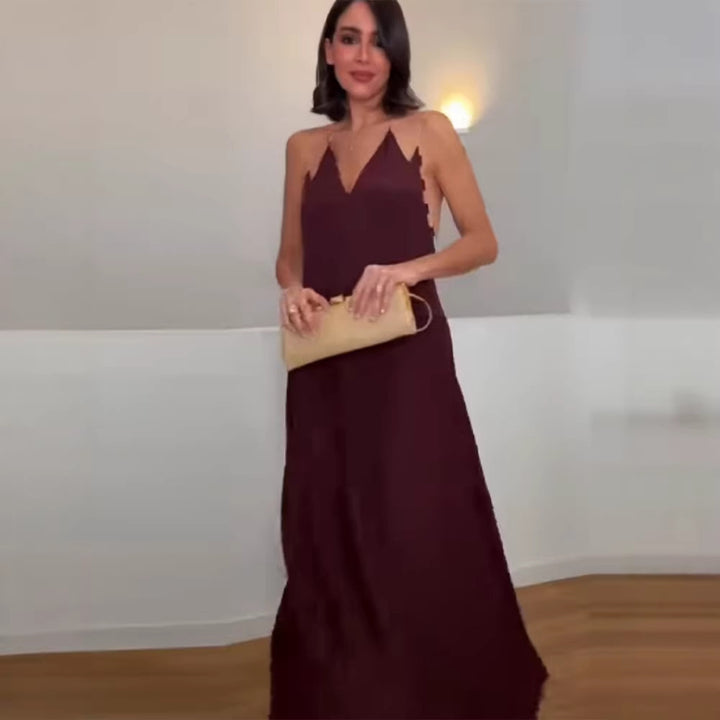 Dame elegant maxiklänning med djup V-ringning och flytande kjol Mirla-Eva Jonsson