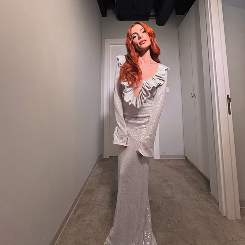 Dame elegant maxiklänning med volangdetalj och transparent insats Mirla-Eva Jonsson