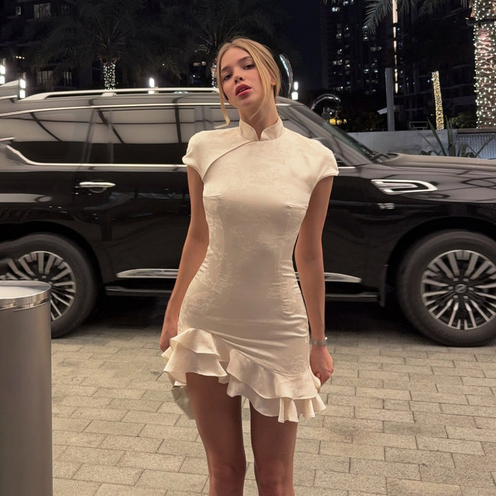 Dame elegant wrap dress with romantic ruffle hem and high collar Mirla-Eva Jonsson