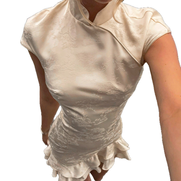 Dame elegant wrap dress with romantic ruffle hem and high collar Mirla-Eva Jonsson