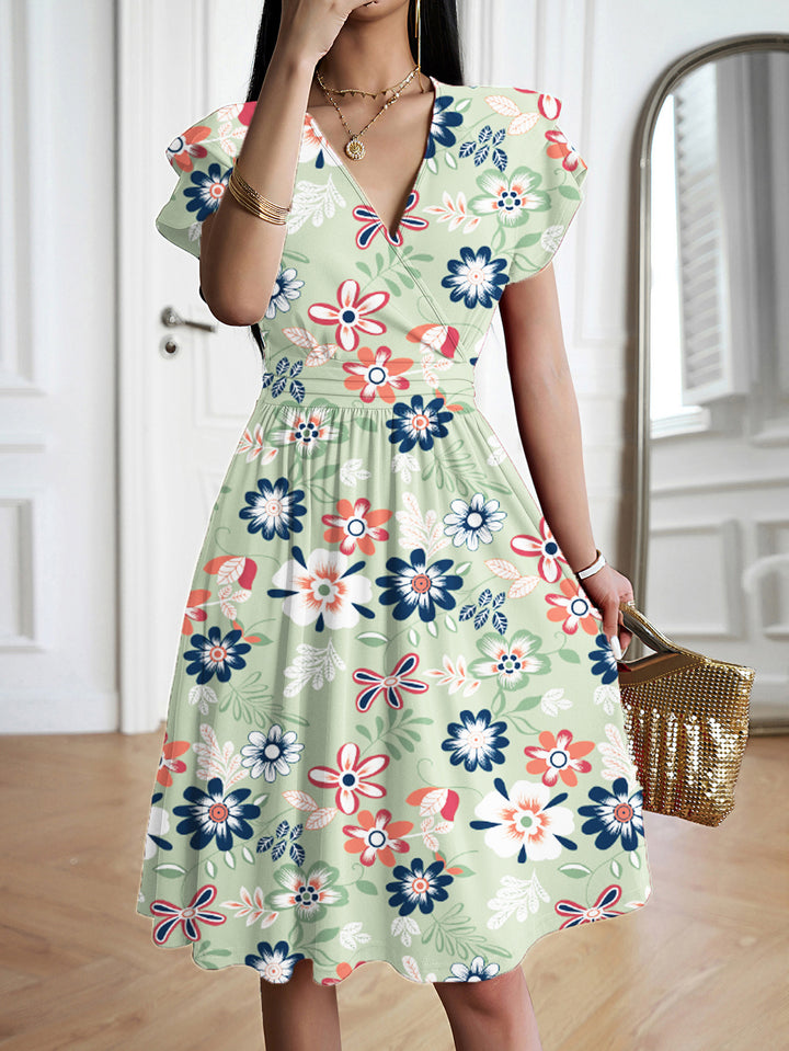 Dame elegant wrap dress with ruffle details and waist Mirla-Eva Jonsson