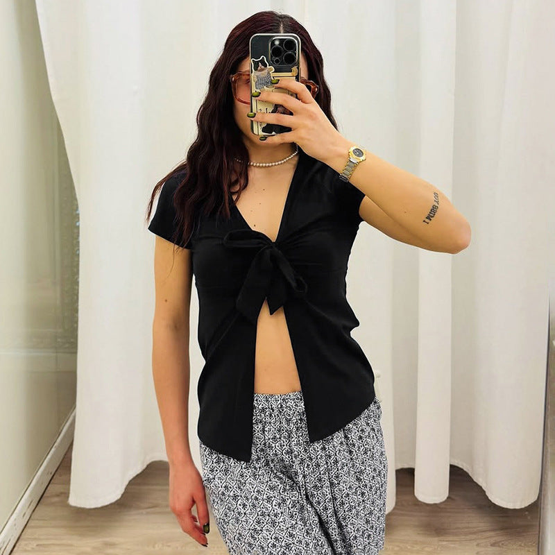 Dame elegant wrap top med dekorativ knut och djup V-hals Mirla-Eva Jonsson