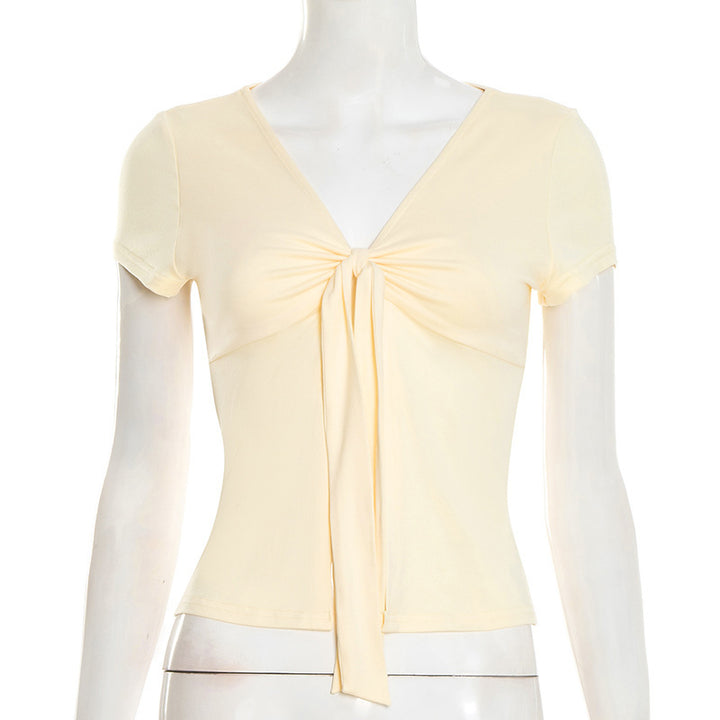 Dame elegant wrap top med dekorativ knut och djup V-hals Mirla-Eva Jonsson