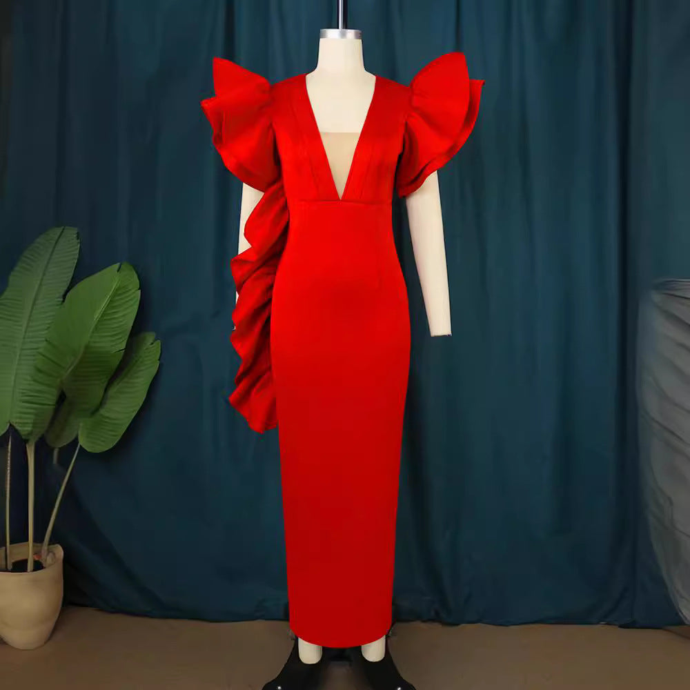 Dame figurformande aftonklänning med voluminösa volangärmar Mirla-Eva Jonsson